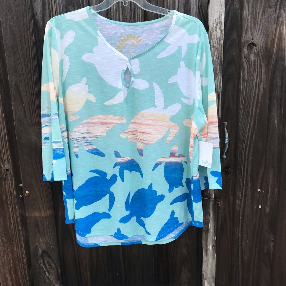 NWT Sun Bay presents a 3/4 length sleeve on a keyhole neck .  Size 2X